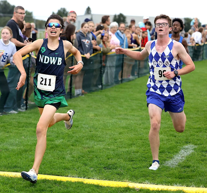NDWB's Calvin Denney, left, Helped the Nike qualify for state.