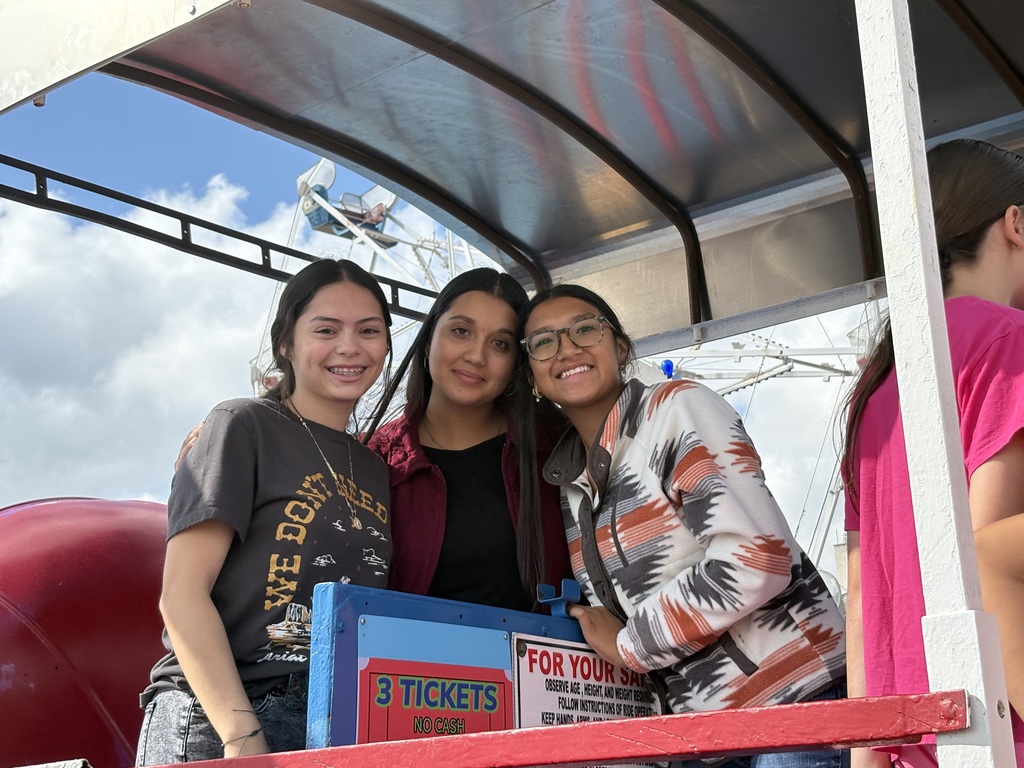 Three students posing for a picture