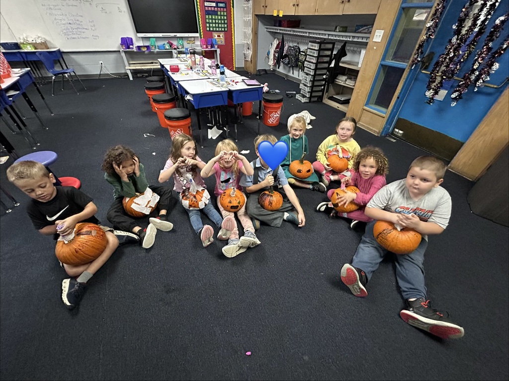 Mrs. Briggs' 1st grade class painted pumpkins! 