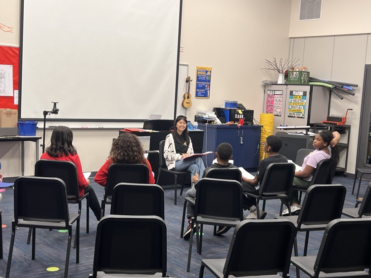Starri working with her cast