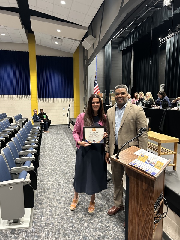 Jennifer Oglesby with Superintendent Smith