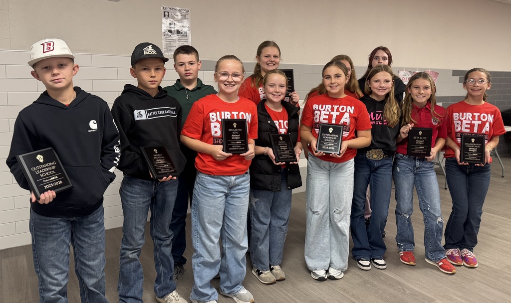 Group of student holding awards