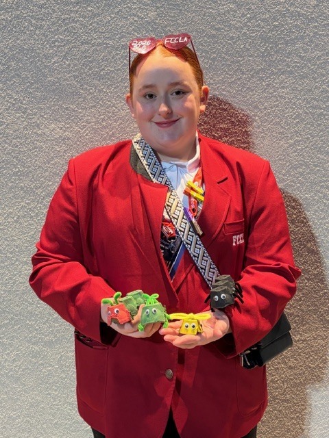 Abby V with her Toys that teach