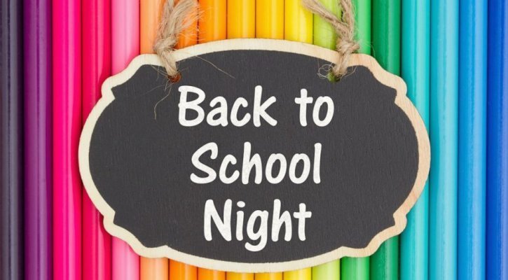 back to school night with colored pencils in the back ground 