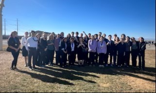 Byers High School FBLA members pose for a picture in the sun.