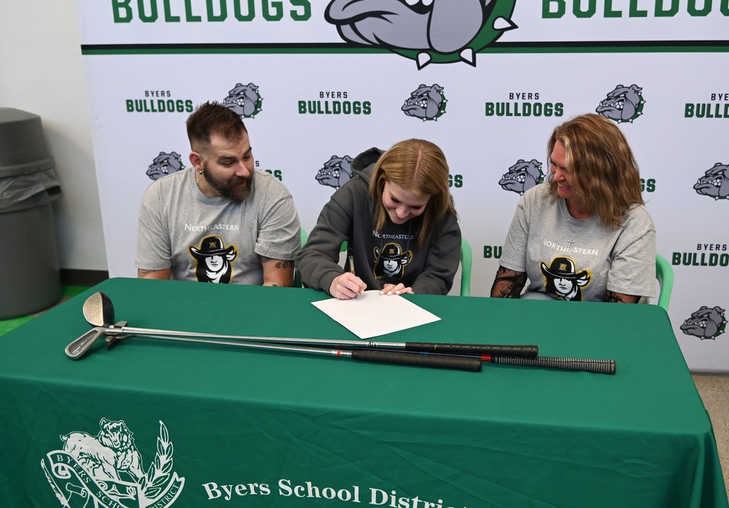 Kierra Signing the letter