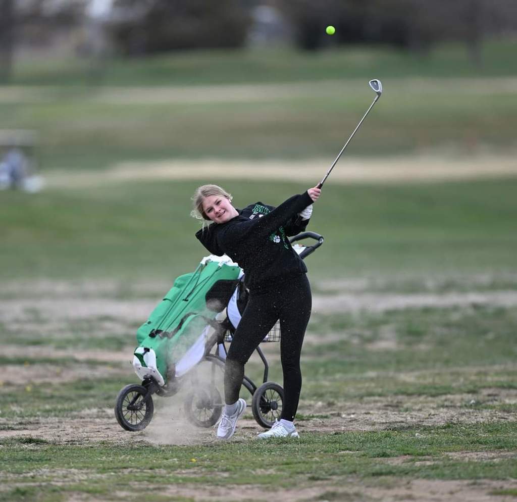 Kiera golfing