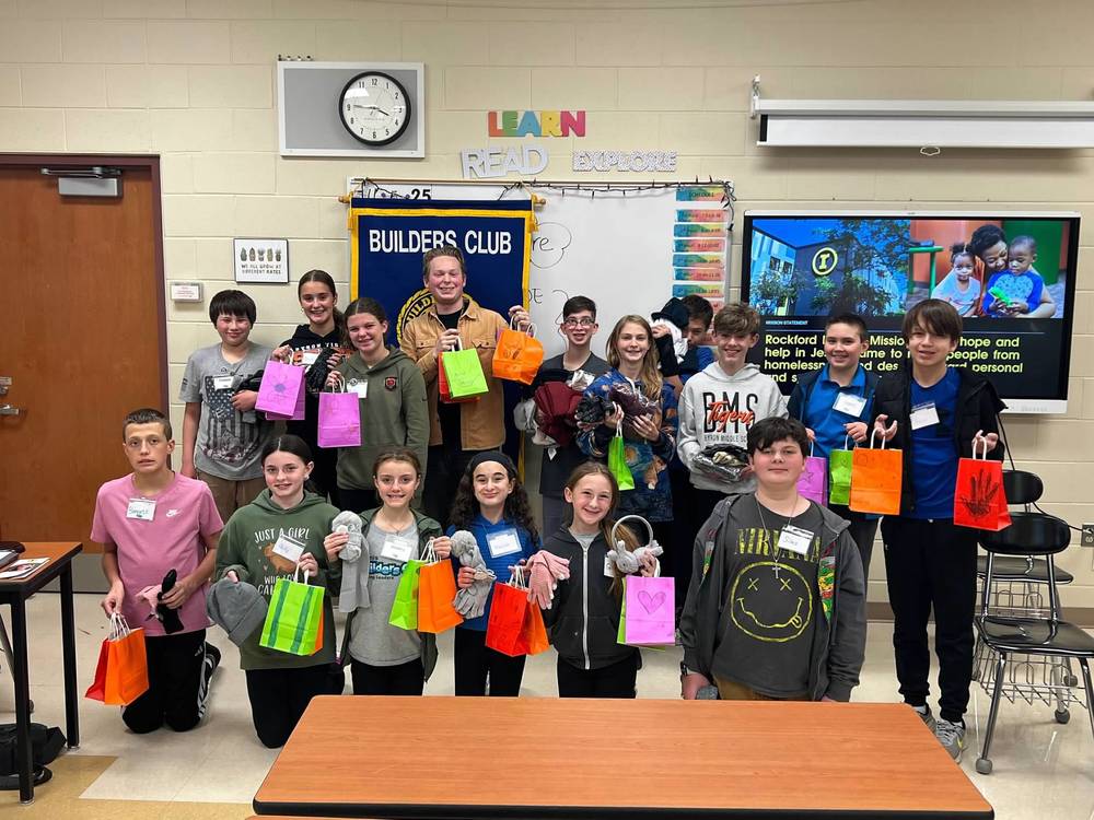 Byron Middle School Builder's Club collecting for Rockford Rescue Mission