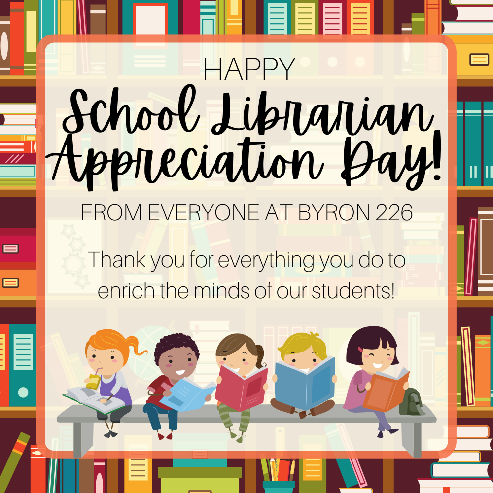 Kids sitting on a bench reading books