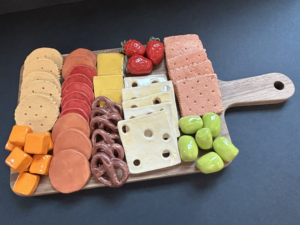 Byron Middle School Principal's Art Choice - Bryn Yerly, 8th Grade - charcuterie board with meat cheese crackers and fruit