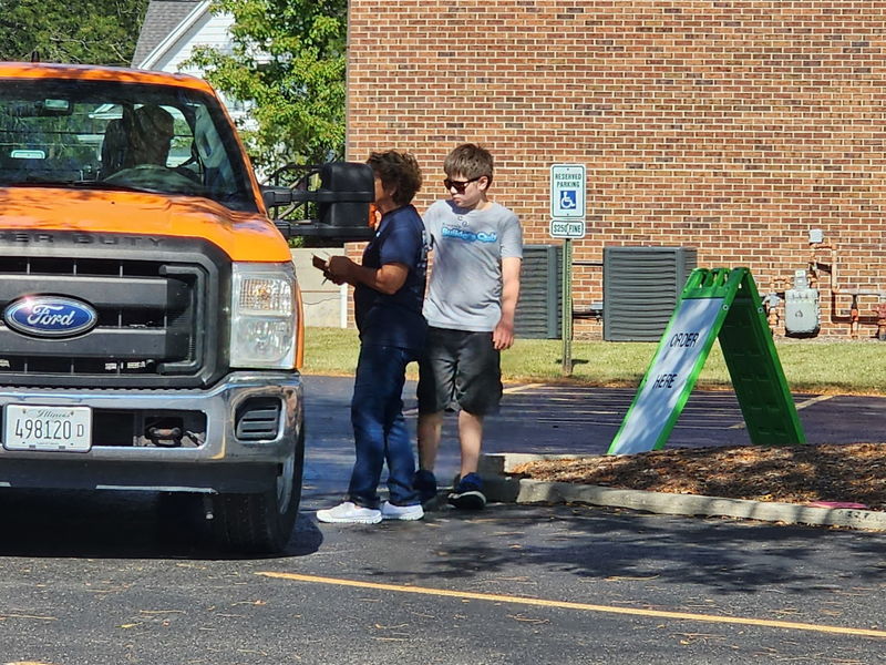 Students taking meal orders