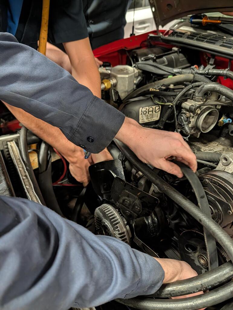 Hands in engine