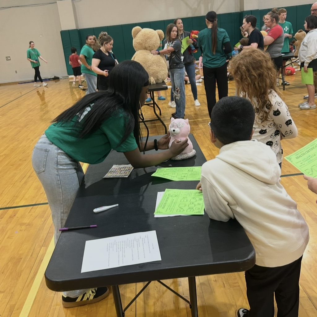HOSA students hosting a Teddy Bear Clinic
