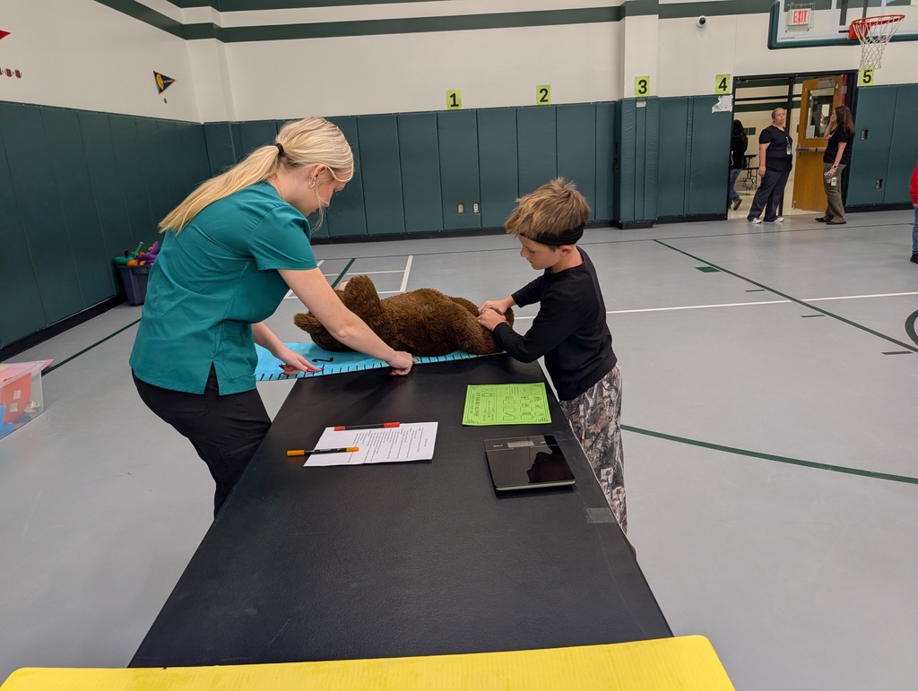 HOSA students hosting a Teddy Bear Clinic