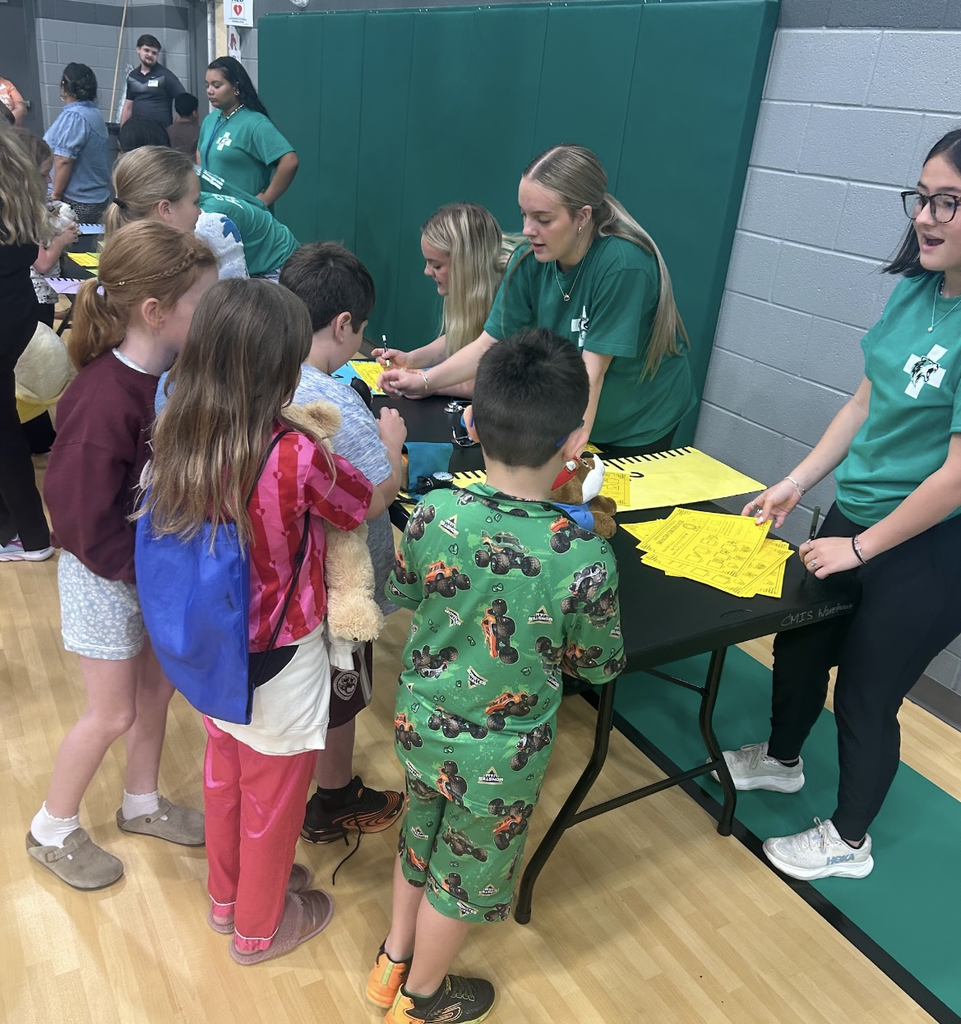 HOSA students hosting a Teddy Bear Clinic