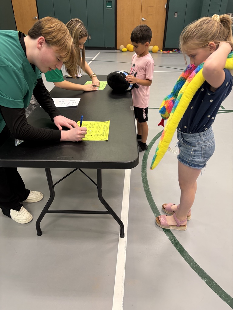 HOSA students hosting a Teddy Bear Clinic