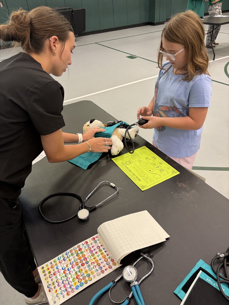 HOSA students hosting a Teddy Bear Clinic