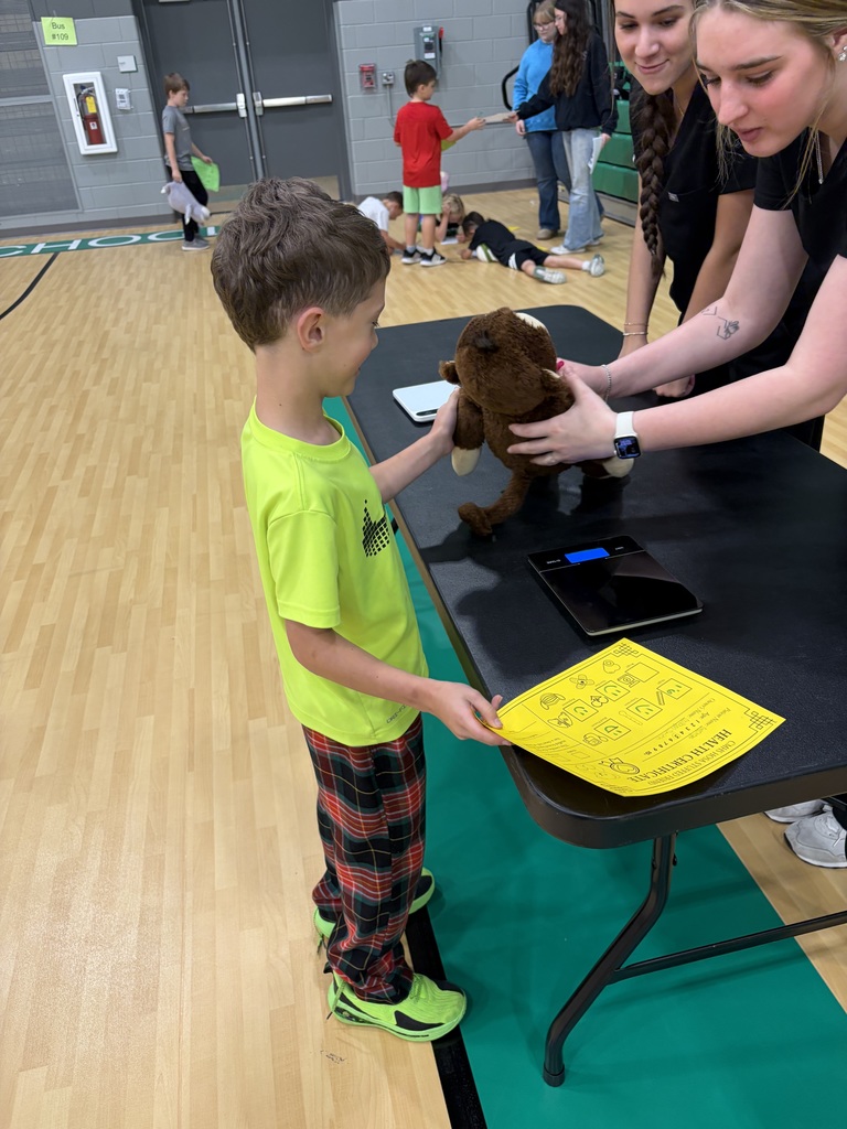 HOSA students hosting a Teddy Bear Clinic