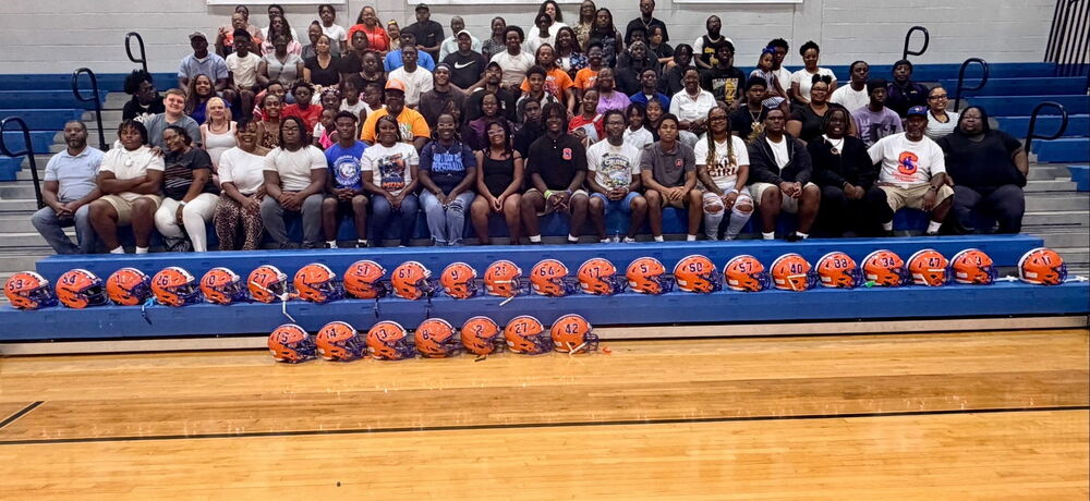 parents and players with helmets