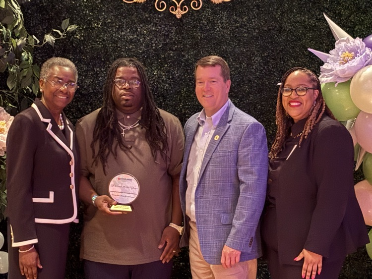 John Taylor is honored as SHE volunteer of the year. 