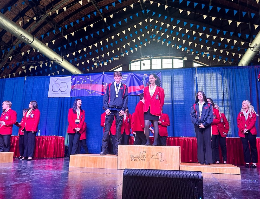 Anthony Roeber standing on the podium at the SkillsUSA championships