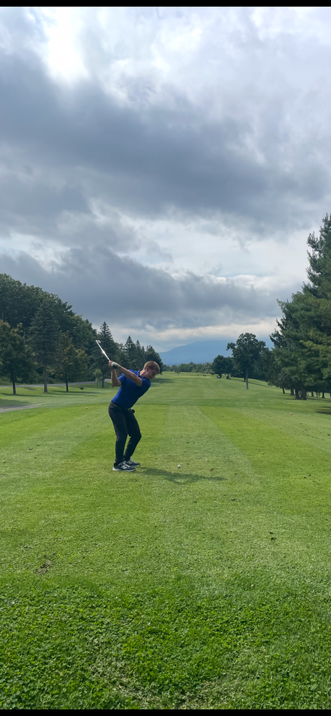 Michael teeing off