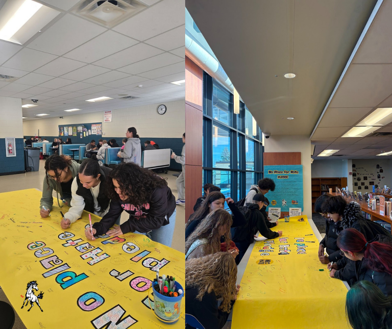 Students Pictured signing the pledge banner