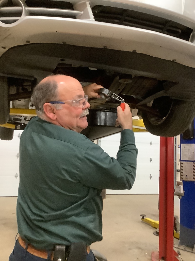 LEARNING HOW TO USE THE OIL FILTER WRENCH