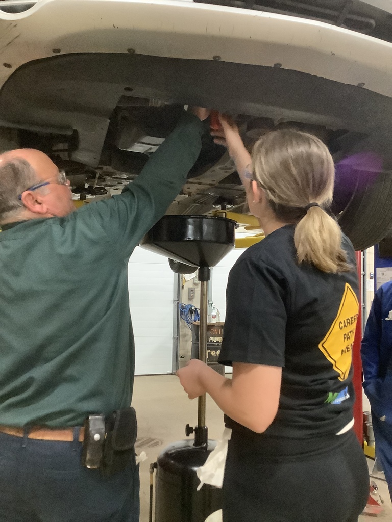 USE THE OIL FILTER WRENCH
