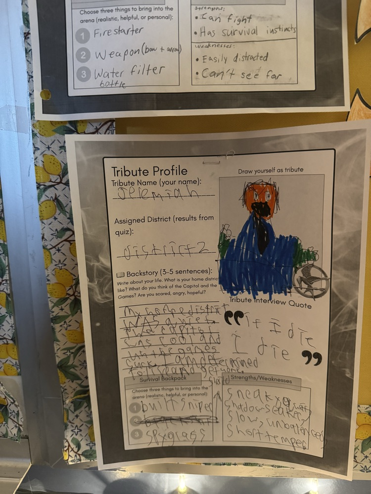 Block 2 ELA are reading the Hunger Games. They took a quiz to find out which district they belong in. Then they created their own Tribute profiles. 