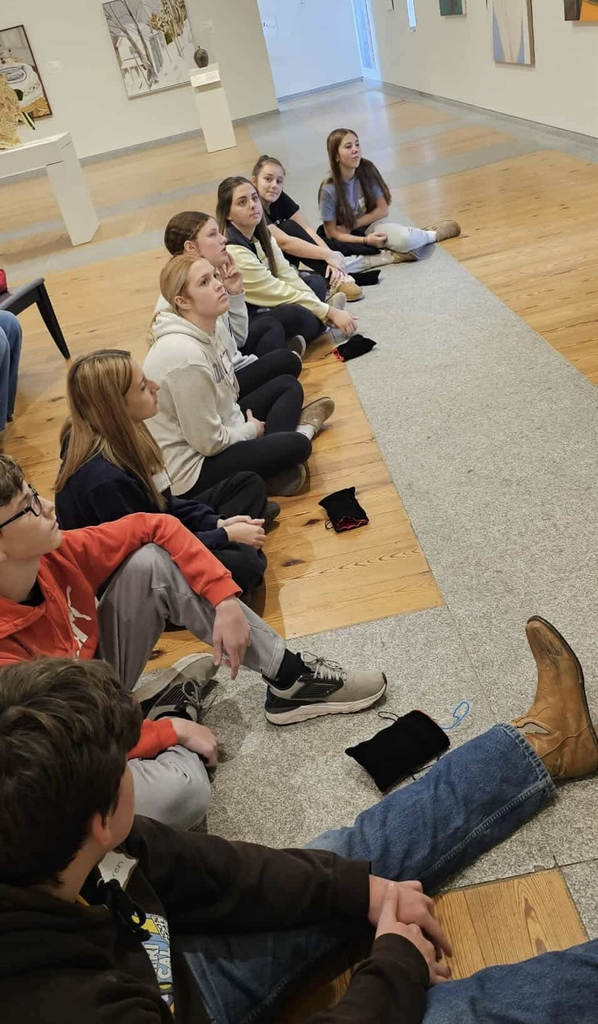 Students learning about artworks at PMA.