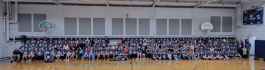 Secondary students and staff in Warrior apparel 