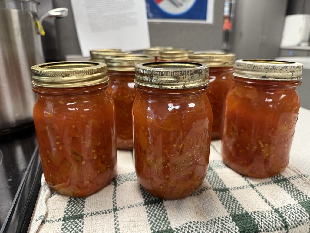 students canning tomatoes in FCS class