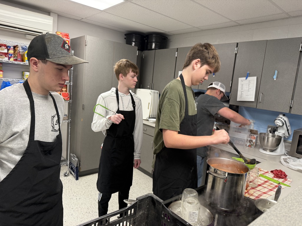 students canning tomatoes in FCS class