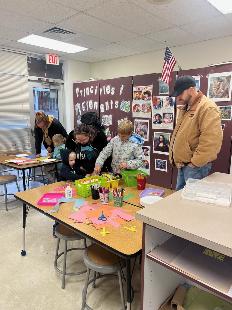 Students are making scarecrows with families- Literacy Night 