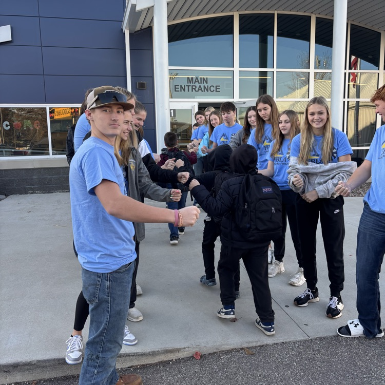 FBLA giving fist bumps