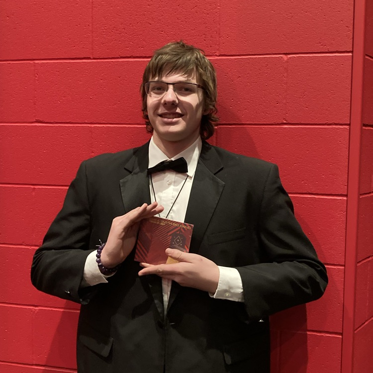 John Prachar holding a CD at the NEIBA Honor Jazz Band