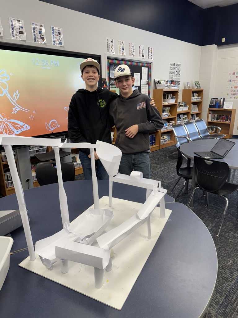 7th Grade STEM students sharing their Marble Run Challenge