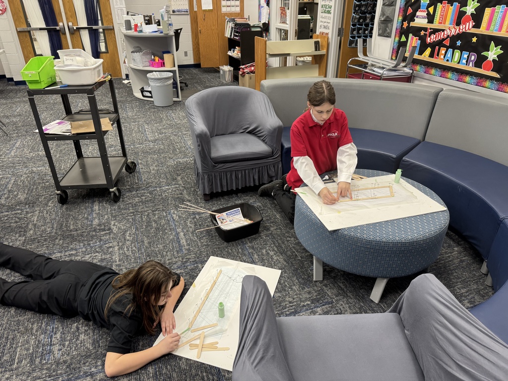 7th Grade STEM students sharing their Marble Run Challenge