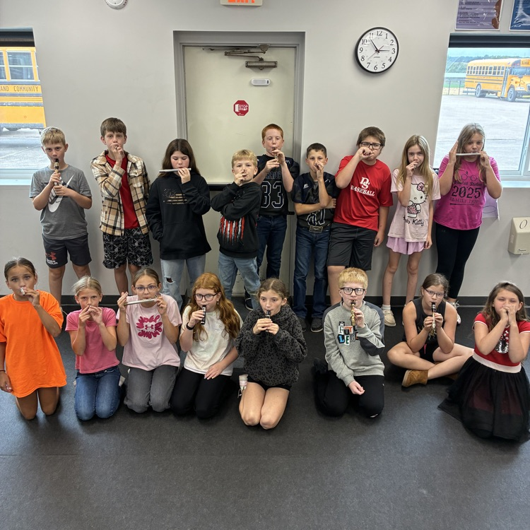 Fifth grade Band students playing their mouthpieces