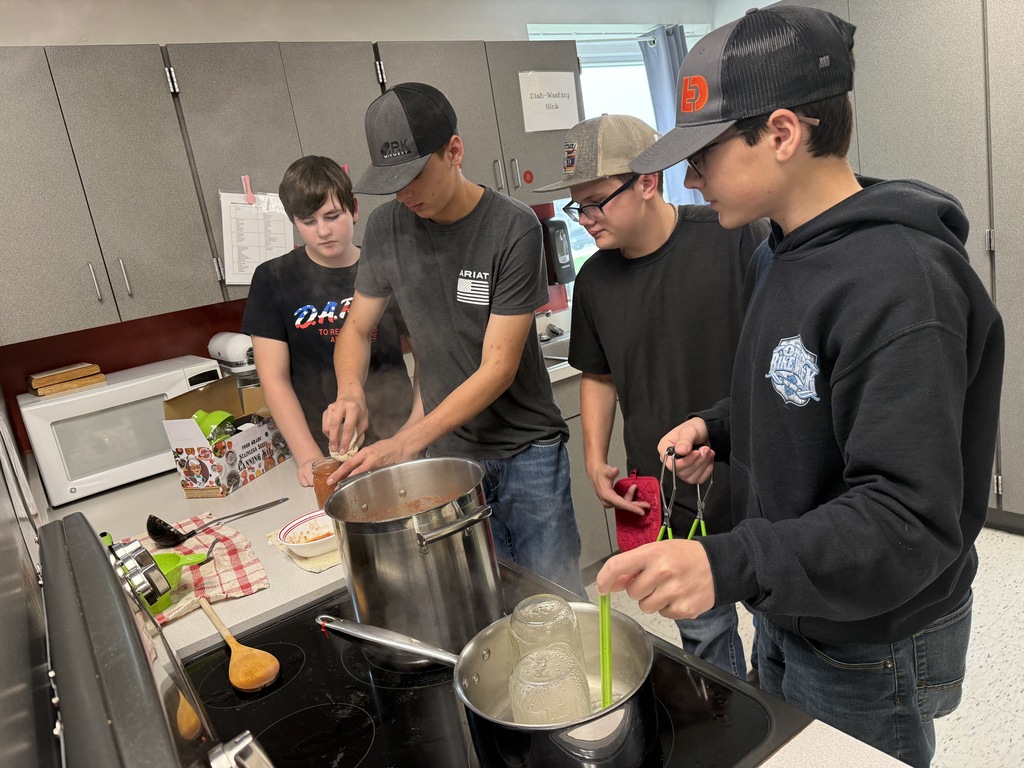 students canning tomatoes