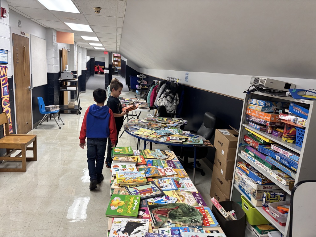 Students picking out books