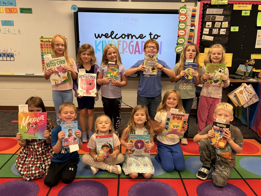 Kindergarten Students With Their Books