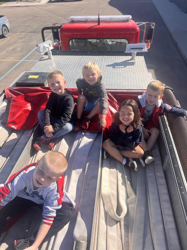 Kids riding on firetruck