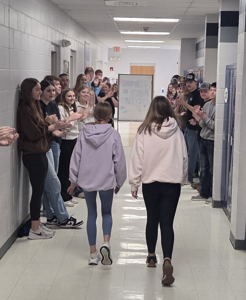 Tynley and Brooklyn walking the hallways