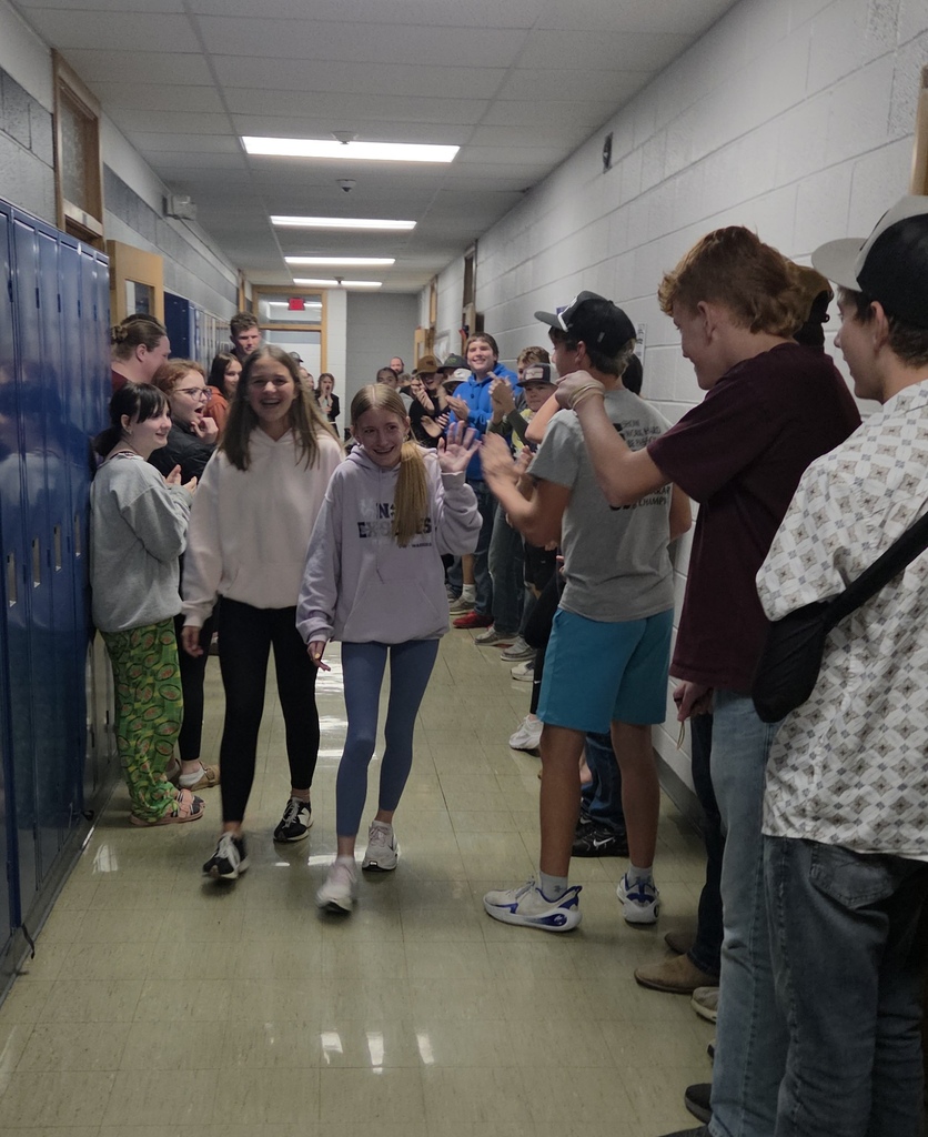 Tynley and Brooklyn walking the hallways