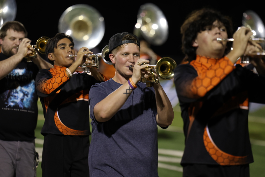 🎶 𝗜𝗡 𝗖𝗔𝗦𝗘 𝗬𝗢𝗨 𝗠𝗜𝗦𝗦𝗘𝗗 𝗜𝗧... 🎶  During halftime of last Friday’s Homecoming football game vs. Giddings, the Caldwell High School Band celebrated an incredible milestone — 𝟭𝟬𝟬 𝘆𝗲𝗮𝗿𝘀 𝗼𝗳 𝗖𝗛𝗦 𝗕𝗮𝗻𝗱 𝗵𝗶𝘀𝘁𝗼𝗿𝘆! 🧡🤍  Over 𝟳𝟬 𝗮𝗹𝘂𝗺𝗻𝗶 joined current band members on the field for a memorable performance that featured musicians, color guard, and even a twirler! Together, they formed a “𝟭𝟬𝟬” 𝗳𝗼𝗿𝗺𝗮𝘁𝗶𝗼𝗻 to commemorate this special anniversary and honor a century of music, pride, and tradition.  Thank you to all our band alumni who returned to make this celebration one to remember! 🎺✨  #CaldwellProud #CaldwellISD #CHSBand100