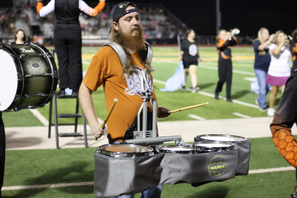 🎶 𝗜𝗡 𝗖𝗔𝗦𝗘 𝗬𝗢𝗨 𝗠𝗜𝗦𝗦𝗘𝗗 𝗜𝗧... 🎶  During halftime of last Friday’s Homecoming football game vs. Giddings, the Caldwell High School Band celebrated an incredible milestone — 𝟭𝟬𝟬 𝘆𝗲𝗮𝗿𝘀 𝗼𝗳 𝗖𝗛𝗦 𝗕𝗮𝗻𝗱 𝗵𝗶𝘀𝘁𝗼𝗿𝘆! 🧡🤍  Over 𝟳𝟬 𝗮𝗹𝘂𝗺𝗻𝗶 joined current band members on the field for a memorable performance that featured musicians, color guard, and even a twirler! Together, they formed a “𝟭𝟬𝟬” 𝗳𝗼𝗿𝗺𝗮𝘁𝗶𝗼𝗻 to commemorate this special anniversary and honor a century of music, pride, and tradition.  Thank you to all our band alumni who returned to make this celebration one to remember! 🎺✨  #CaldwellProud #CaldwellISD #CHSBand100