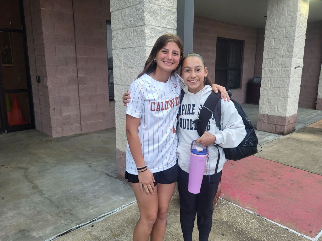 Serving smiles this morning… bringing the heat tomorrow 🔥  Our Lady Hornets kicked off the day at CIS opening car doors and greeting students—because that’s what it means to be a Hornet.  Next stop: PLAYOFFS. 🥎 Round 1 starts tomorrow—let’s go!! #CaldwellProud #CaldwellISD
