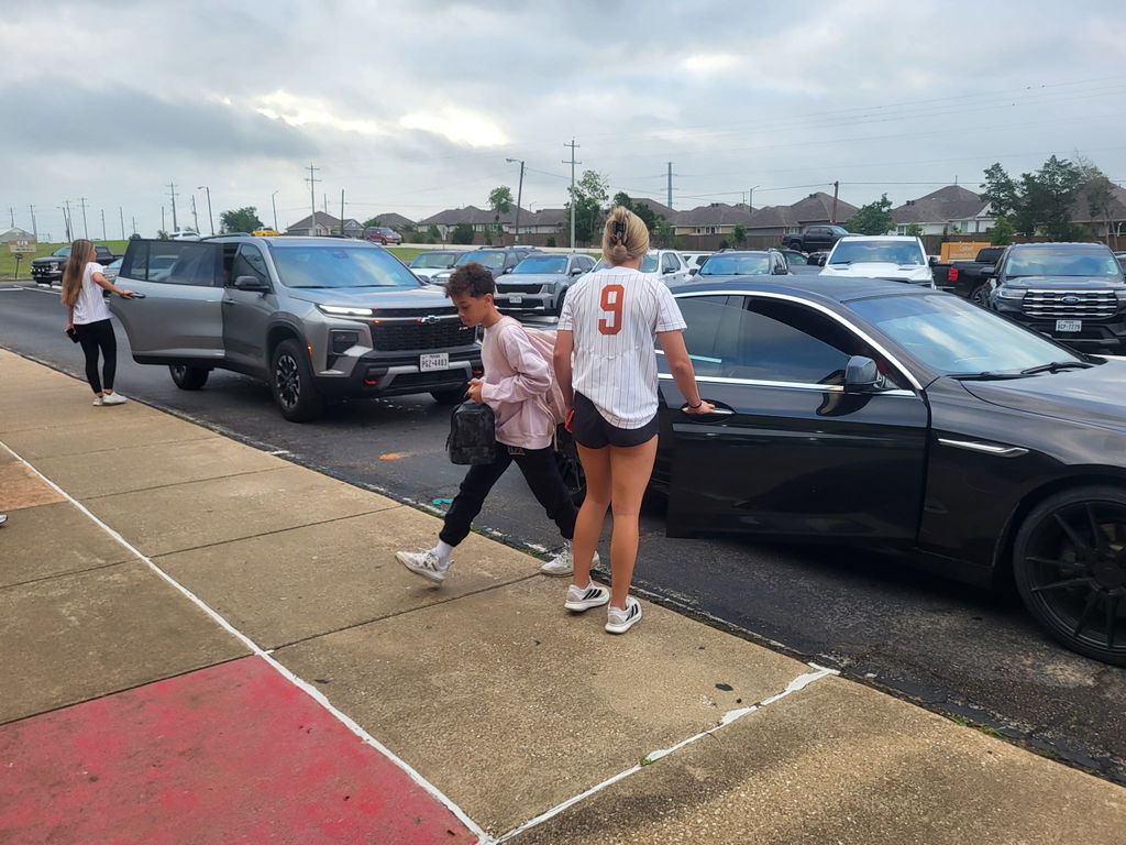 Serving smiles this morning… bringing the heat tomorrow 🔥  Our Lady Hornets kicked off the day at CIS opening car doors and greeting students—because that’s what it means to be a Hornet.  Next stop: PLAYOFFS. 🥎 Round 1 starts tomorrow—let’s go!! #CaldwellProud #CaldwellISD